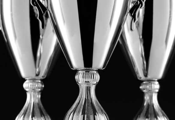 close up silver cup trophies