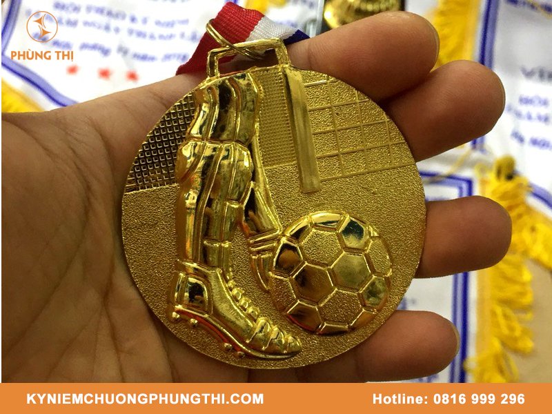 Mẫu huy chương đá banh